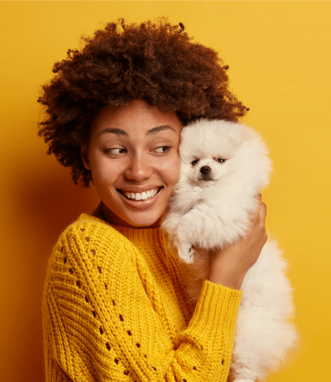 woman-holds-spitz-dog-near-face-has-happy-mood-likes-loyal-devoted-domestic-animals